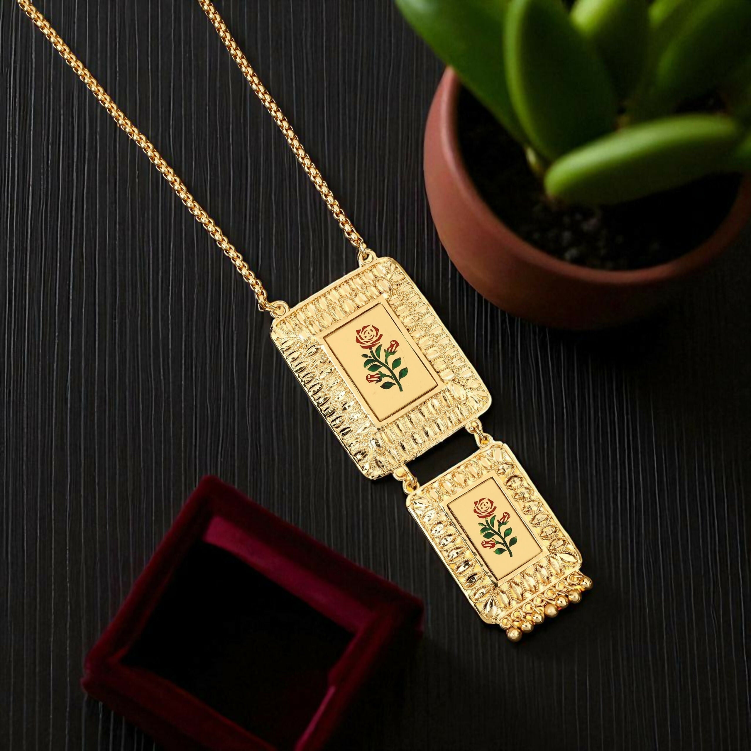 Enhance your jewelry collection with this exquisite Gold-Plated Long Chain Necklace, designed to reflect timeless Indian artistry with a modern touch. Featuring a unique double-pendant design, this necklace beautifully blends traditional elegance with con